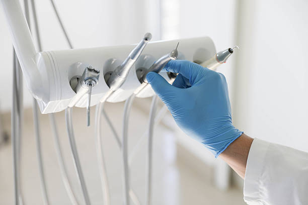 Professional Tooth Extraction technician working in DuPage County County, IL
